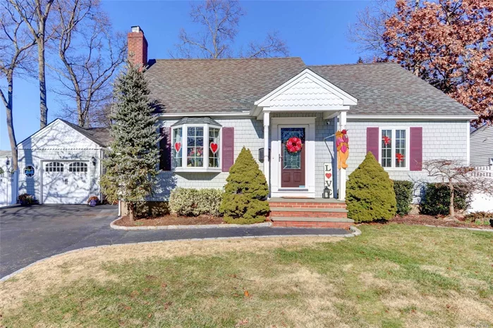 The Home you been waiting for.Classic 4br Cape in the heart of Massapequa Woods.This Charming home sits on a beautiful 80x100 ppty in sd#23.Living rm with fireplace, Enclosed breezeway/vaulted ceiling off Dining area.Updated Baths, Rear dormer. Fin Basement, Oversized driveway 4 a/c units , 1 Ductless unit in fin. basement .Great area close to railroad, Low taxes of $8901. with basic star!