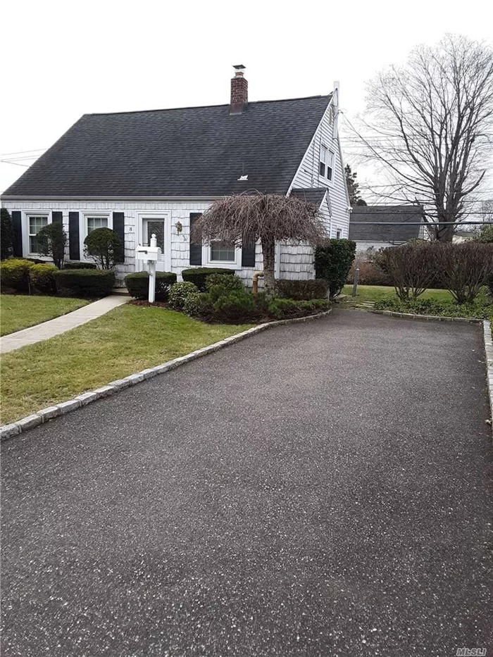 Beautiful Well Maintained Cape Code In Levittown - 5 Rooms - Updated 1 Bathroom, Gas Conversion Completed, In-Ground Sprinkler, Close To Long Island Rail Road, Private Driveway, Must See If Looking In Levittown!