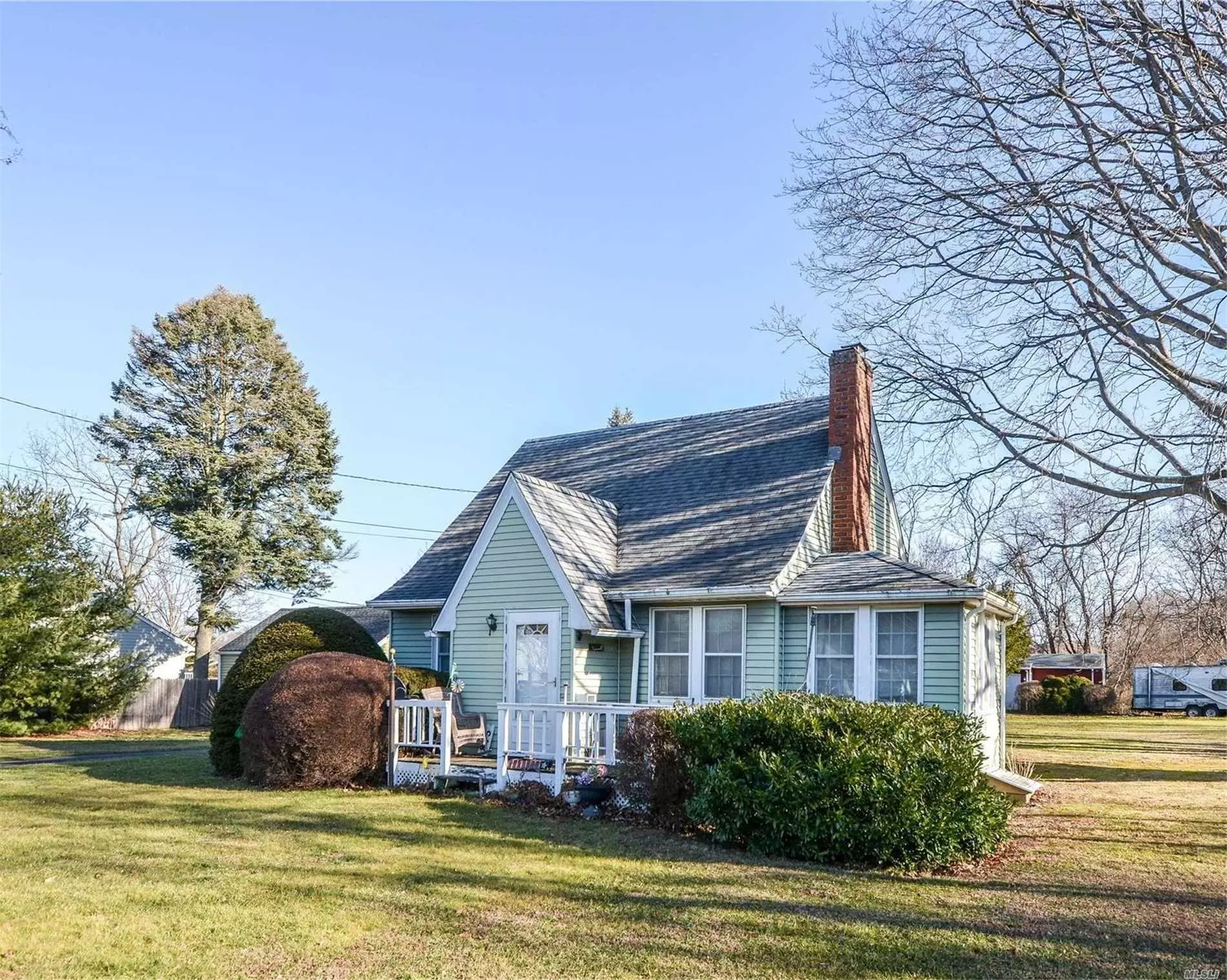 Quaint cottage loaded with character, hardwood floors, fireplace, moldings and trim. This property has 3 out buildings and plenty of room to expand. Less than 1 mile to South Harbor Beach, which is known for its expanded sandy beach and access to kayaking.
