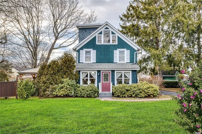 This Charming Home in The Heart of Center Moriches Has a Great Layout with lots of Natural Light. Features Include: Updated EIK, Heating System and Electric, Pine floors under most of the flooring in the house, Basement, In ground sprinklers, 4 Car Garage, Beautifully landscaped yard. Close to town, shopping, restaurants, beaches. Call Today!!!