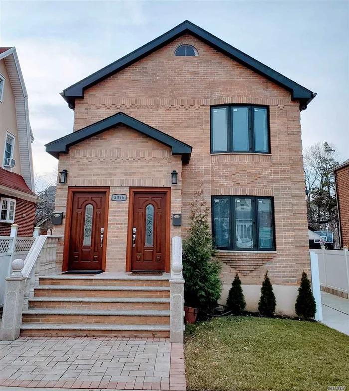 Beautiful brick detached 2 family rebuilt 2017 featuring gorgeous high end finishes, hardwood floors, custom tiles, 6 bedrooms, bonus attic room, detached garage, large backyard, 10 ft wide driveway, separate basement entrance, many green energy features, 1 block from Browne Park, 7 minutes drive to downtown Flushing, quiet residential block and much much more. Must see to appreciate details and extras!