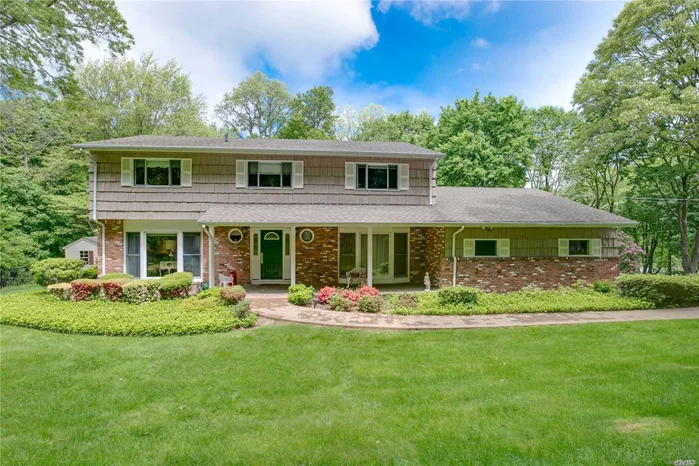 Lovely center hall colonial on private 2 acres. Large formal LR with hardwood floors. Formal DR w/hardwood floors. Spacious EIK w/new refrigerator, Family Room with Fireplace and sliders out to patio, In-ground pool. 2 car garage