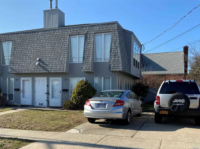 Great Investment, Multi Family Duplex, each apt has LR/DR combo, EIK, 1.5 bath & Loft Style bedroom, apts rented @ 1900 & 1400.00 Rent roll of 39, 600.00 per Year Gas Heat, CAC, Shared used of Washer & Dryer, Each 2 family has its own driveway