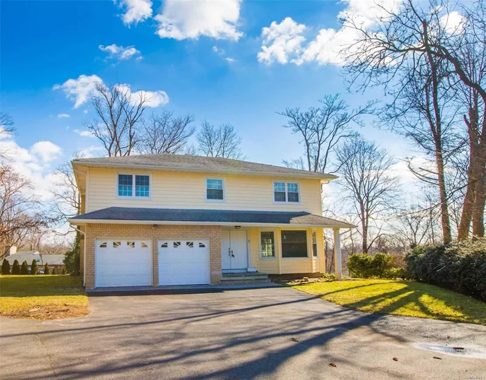 This is a completely remodeled colonial with everything brand new from kitchen to bathroom, over 2400 sq ft living space featuring hardwood floor,  Large living room with wood burning fireplace, top of the line appliances. Second floor has Master Suite with walk in closet, 3 bedrooms. Central air system, 2 Car Garage. Conveniently Located Near Major Highways & Roadways. Herricks school district.