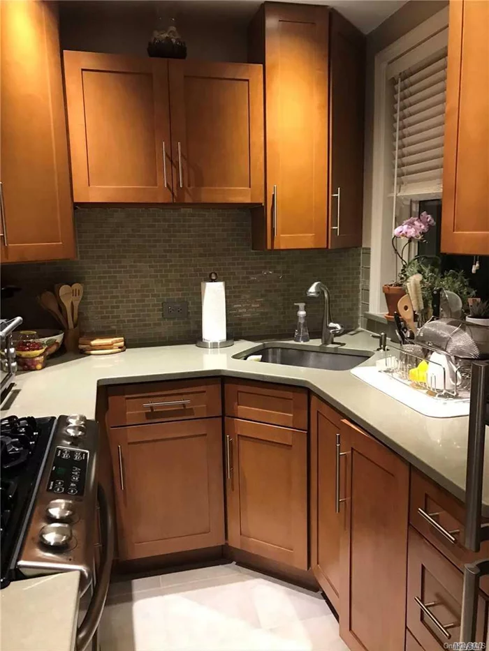 Baydale Tenants Corp. Beautifully Renovated 2 Bedroom Co-op on the 2nd Floor. Updated Kitchen and Bath, New Moldings and Doors, Refinished Wood Floors, Bright and Airy End Unit, Quiet Residential Block, Close to LIRR, Bus, Shops and Schools. SD26