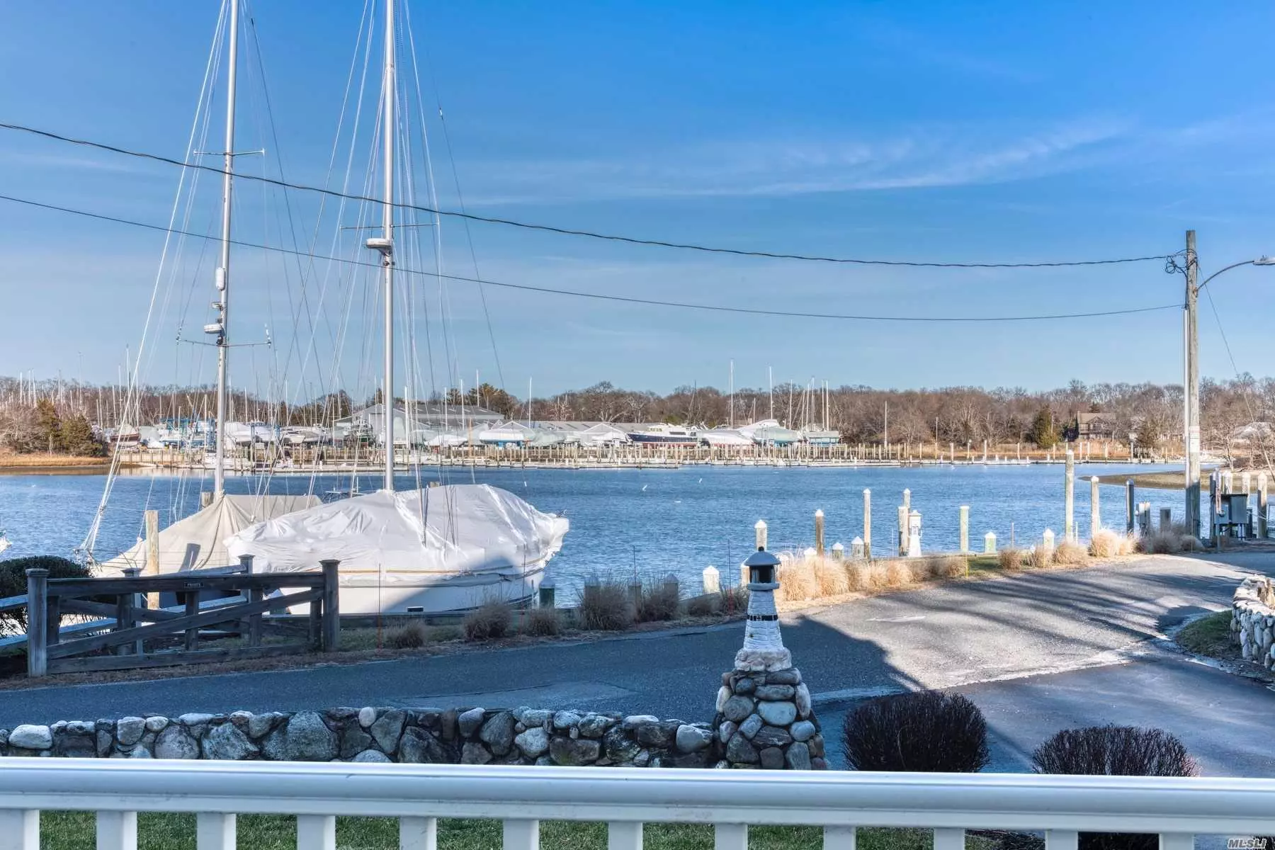 Enjoy easy, breezy living at this turn-key ground floor co-op with stunning harbor front views. This beautifully updated unit features an open water view kitchen and living room with a relaxing waterside deck. Perfect as a pied a Terre or for year round living. Conveniently located near all of Greenport&rsquo;s fabulous dining, shops, and seaside historic charm. Keeping it simple never looked so good.