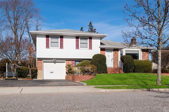 Spacious Syosset Expanded Split 4 Bedrooms, 3 1/2 Baths, Eat in Kitchen, Dining Room, Living Room, Den, Family Room with Full Basement, Garage and Beautiful Private Yard. All this near Schools, Shopping, Transportation, and Highways.