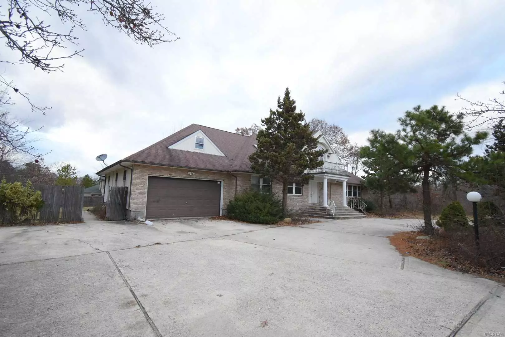 Huge Custom-Built Colonial on a Cul-De-Sac! Secluded Location! CAC! Granite! Full Finished Basement w/ OSE ad 10&rsquo; Ceilings! Hardwood Floors! Den w/Fireplace! MBR Bath w/Jacuzzi and Steam Shower, 2 Story Entrance, 2 Car Garage was Converted to Living Space! Needs TLC!