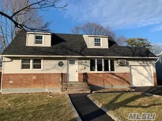 Nothing left untouched here! New chef&rsquo;s kitchen w/ custom granite & white shaker cabinets, SS appliances, dark walnut HW floors, 2 brand new full baths, huge TREX deck w/built in planters & bar table off the sliders from kitchen overlooking the fenced & private huge backyard! Attached garage has additional storage above!