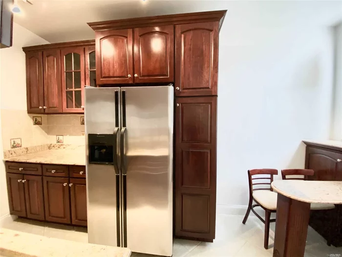 Spacious and bright. This three bedroom home features an updated kitchen, stainless steel appliances, and a washer/dryer. Conveniently located to transportation, restaurants, shops, and School District 26.