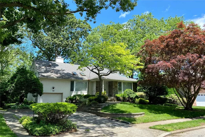 Stunning 2445 sqft Eldorado( front to back) in an inner quiet street in the heart of East Birchwood! facing south, Specimen Landscaping with flowering trees and plantings! Split with soaring ceilings, 2 sky light, with fireplace living room, classic white kitchen with extended eat in area. side door to deck, Large Master Suite with dressing area, Laundry room on ground floor, 2 car garage, Central air, 2 heating zone, brand new gas heating system, In ground sprinklers! Near library,  Jericho atrium, Jericho School District- Jackson Elementary!