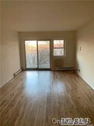 LR, DR, EIK, 2 bdrms, office, 2 baths, large balcony and garage. Close to major highways , LIRR and buses. cat or dog under 10 pounds allowed