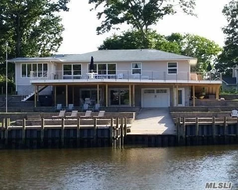 Spacious waterfront in Gardiner&rsquo;s Bay Estates with private dock and direct access to Bay.