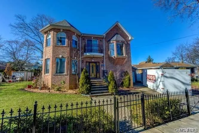 Gorgeous Brick, Custom Built & Young Colonial In Bayside! Featuring Beautiful Granite Entrance Foyer and Extra Wide Staircase. Large Formal Dining Rm with Special Fluted Moldings, Living Rm w/ Fireplace, Spacious Eat-In-Kitchen,  Large Bow Windows and Hardwood Floors Throughout. Master Ste W/ Walkin Closet & Balcony, 2 Bedroom Suites w/ Balconies, Laundry Room on 2nd Fl. Full Finished Basement w/ 10 ft Ceilings & Full Ba. Central Vac, Sprinkler System, 2 Driveways, 1 Car Garage & Landscaping