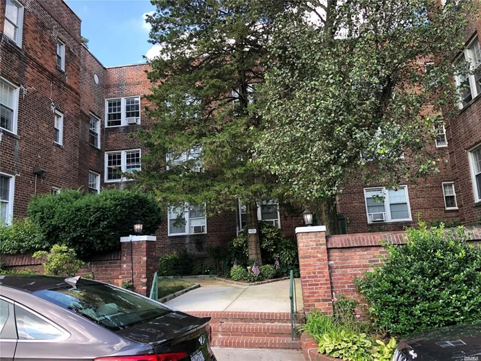 Sunny, 1 bedroom apartment featuring spacious living room/dining room area. Beautiful kitchen, Wood Floors throughout the unit, marble bath, laundry in the basement.Close To All.