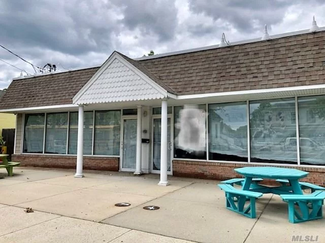 Commercial storefront located in busy village of Islip. Full build out and building reno done 5 years ago which included new roof, doors, 400 amp 3 phase electric and HVAC. Handicapped accessible bathrooms. Building is in prime condition. Property currently offers municiple parking in front with approx 10 spaces in private back lot. Potential for expanded parking. TWO units available. Approx 1200 sq. ft each unit. $200/mo CAM charges. 1/3 Tax increases to tenant. Tenant pays utilities.