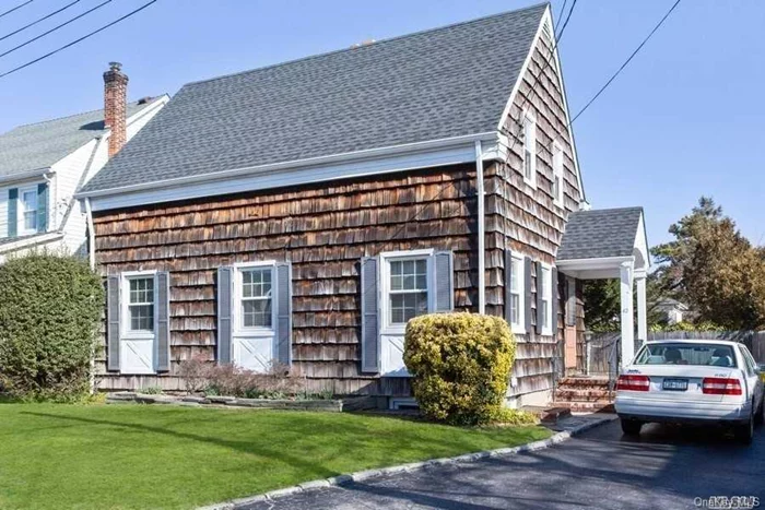 Charming, Cozy & Affordable 2 Bedroom Side Hall Colonial, situated on Quiet, Secluded Cul-de-sac. This 3 Story features an entrance foyer, large living room/dining room with Fireplace, 2 Bedrooms and Plenty of Storage. Beautiful Wood Floors & Large Basement with High Ceilings, 1 Car Garage & Room to Expand