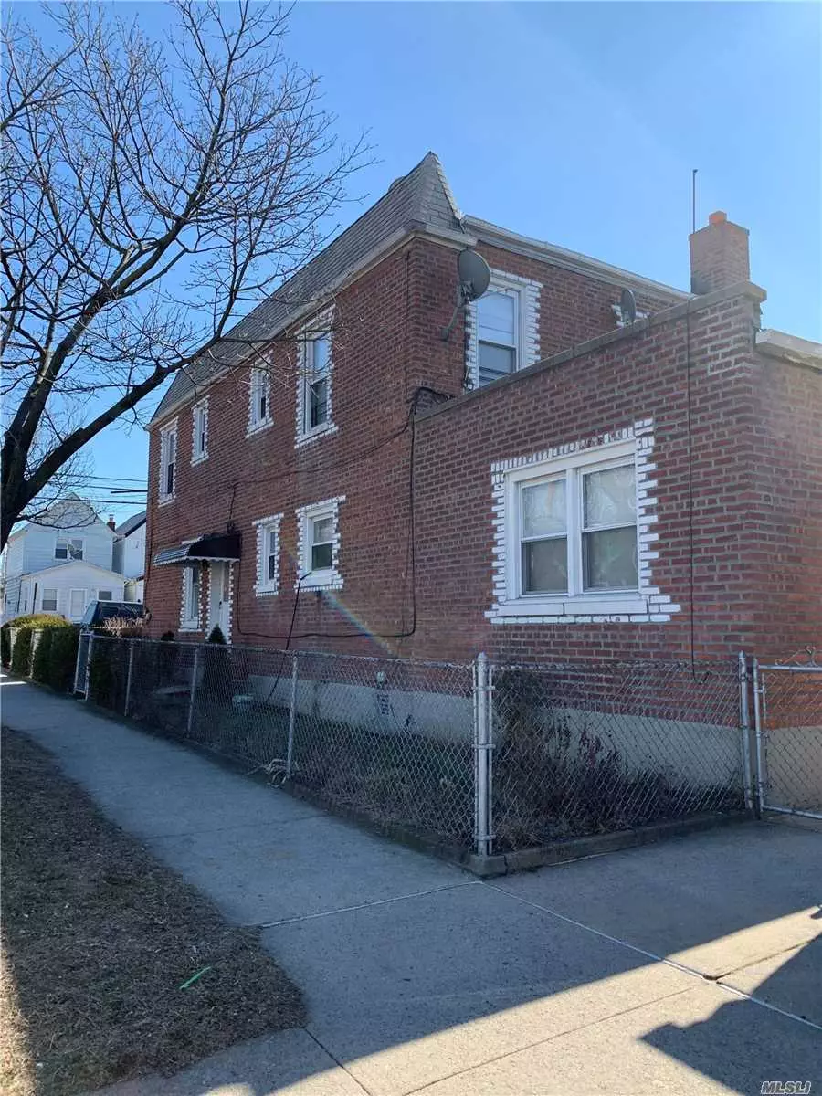 Great income producer property, Solid Brick, 2 car Garage, Corner House, Close to JFK Airport, Highway, Stores and More to see.