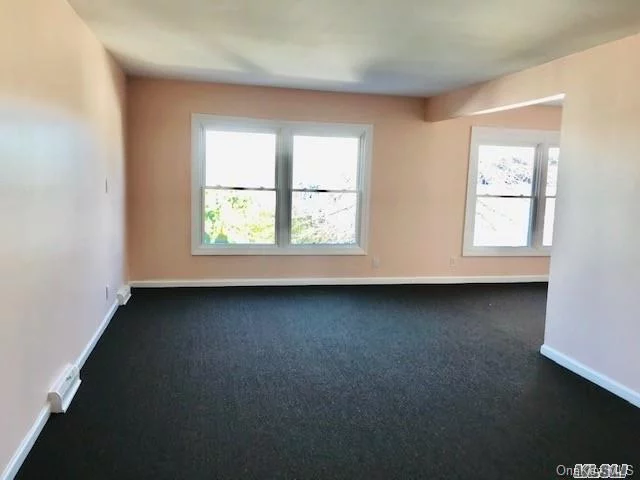 Big size Apt. on second Floor. Renovated. New floor Carpeting. New Kitchen appliances. washer and Dyers in the unit. Near by LIRR. Bus. Parkway.