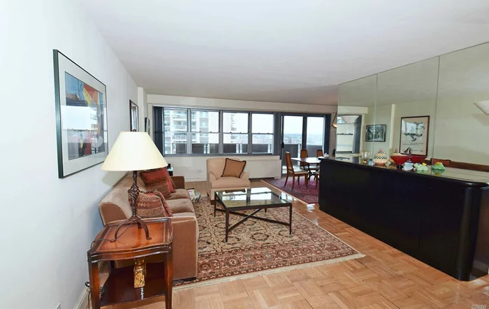 Beautiful 2 BR deluxe apt with 2 balconies with spectacular views. Hardwood floors Luxury doorman bldg. Dining room 2 baths. Amenities: Deli, Dry cleaners, Salon, Gym, Tennis Courts, Pool Playground