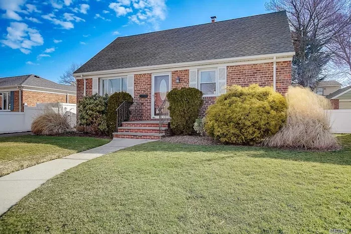 Stunningly appointed home in desirable Bethpage! Mint, bright sunfilled brick Cape showcases refinished wooden floors, eat-in kitchen, new carpeting on the second level and fresh paint throughout the home, and full finished basement with high ceilings and outside entrance. Well-maintained landscaped garden and move-in ready. Thoughtful updates include newer roof 2018 and bath 2017. Convenient to shopping, dining, LIRR, and major roadways.