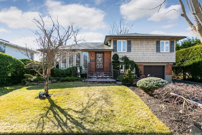 Beautiful Expanded Split features 3 Bedrooms, 2 Updated Bathrooms, Large Family Room Extension w/Fireplace and 2 Skylights, Updated Kitchen, CAC, IGS, Newer Burner (Approx. 5 yrs), New HW Heater (3 yrs), Woodward Parkway Elementary School. Low Taxes.