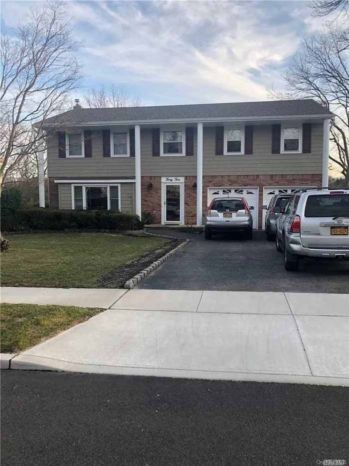 Outstanding center hall colonial. Everything is renovated. New roof, new siding, new gutters, new windows, new eik, new baths, new finished play room w/ foot table. New cesspool, new stone flooring, new sheet rock, new plumbing, new electric. All electric, front door, and thermostat controlled by phone.