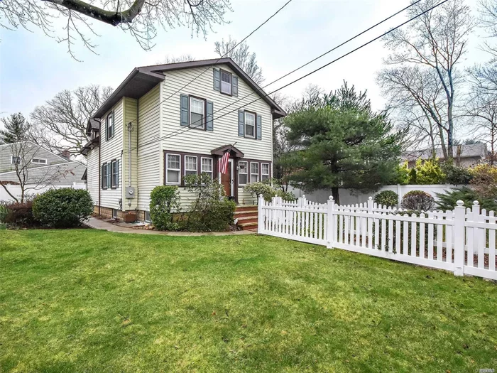 Charming early 1900s Colonial with attention to detail features beautiful wood work and stained glass. Front sitting room welcomes you in with a cozy wood-burning stove. Open living room dining room with large windows give plenty of sunlight. Kitchen features vaulted ceiling with stained glass and breakfast nook. Skylights in the upstairs bedrooms and fully finished basement with room for separate entertainment room.