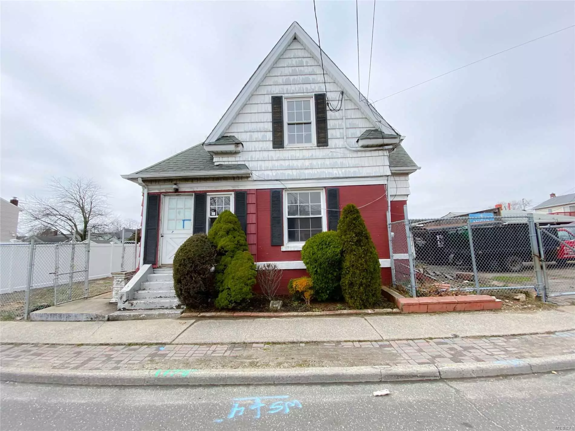 Bethpage Old Style Home. This home offers Four Bedrooms, Two Full Bathrooms with a Full Basement. Includes A Large Large Living Room & Den W/Lots Of Natural Light.***Property is sold as-is buyer taking title subject to encroachments.***See survey**