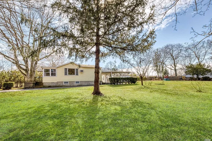 Wow! Endless Possibilities for This .46/Acre Sub-dividable Lot in Miller Place Schools! Adorable 2 Bedroom, 1 Full Bath Ranch with Hardwood Floors, Updated Bath, Full Finished Basement with Den, Laundry, Utilities, & Inside & Outside Entrances, .46/Acre with Deck, Patio, Shed, Over-sized Driveway with Carport, & More! A Must See! Low Taxes - $4, 510.39 with STAR, Plus Separate Lot $392.06, Total with STAR: $4902.45
