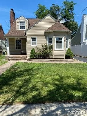 UPDATED CAPE FEATURES 4 BEDROOMS, LR, DR W/ FIREPLACE, EIK, FULL BASEMENT, AND FULL BATH! CLOSE TO TRANSPORTATION! WONT LAST!