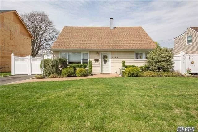 Cape cod home with extended mud room with washer and dryer. Eat in kitchen with gas cooking. Master bedroom on first floor. Beautiful yard with patio and detached oversized garage for storage or car. Can move in immediately.
