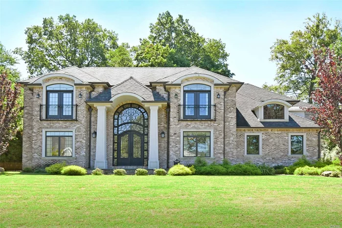 The grand entryway with a sweeping staircase draws you into a voluminous layout made for entertaining. Elegant Living room & banquette sized Dining room, tremendous chef&rsquo;s kitchen, den with a stone fireplace and glass doors to the backyard, The 6 bedroom home includes the divine master suite presents tray ceilings, massive windows and Marble bathroom. Lower level has theater, rec room & Gym. Residents has access to Lake Success country club. Award winning Great Neck South school.