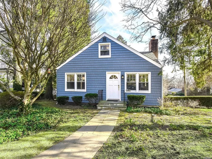 Return to simpler times with a picturesque cape on a corner lot, with brand new Pelican Bay Polymer shake siding. This home welcomes you with a warm entrance to a cozy living room with fireplace, hardwood floors throughout, and a true formal dining room. Park two cars in the long driveway or garage and head to the beach. Virtual Tour https-//tours.heidihuntphotography.com/1558391