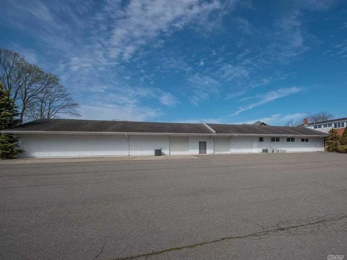 Move-in ready Heated Warehouse Spaces With High Ceilings And Main Road Location In Mattituck&rsquo;s Hamlet Business District. 3, 200 sq ft and 2, 200 sq ft Warehouse/Storage Space Is Ideal For Businesses Looking To Expand Their Brand Exposure Without A Steep Price. Opportunity For a Flex Warehouse With Office Space Also Available So You Can Manage Operations On Site While Still Having A Quiet Space To Work. Many Possible Uses Including Manufacturing And Distribution Center, Craft And Printing Businesses, Car/Boat Storage, Serviced Warehouse Center For Small Businesses And Entrepreneurs. Ample Parking Available.