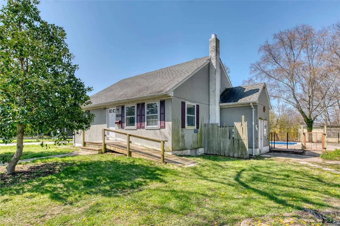 Rare Fixer-upper in Greenport. Sweet Quiet Classic Cape on a Large Corner Lot in Need of TLC. A True Diamond in the Rough Waiting to be Polished. Will Not Last!