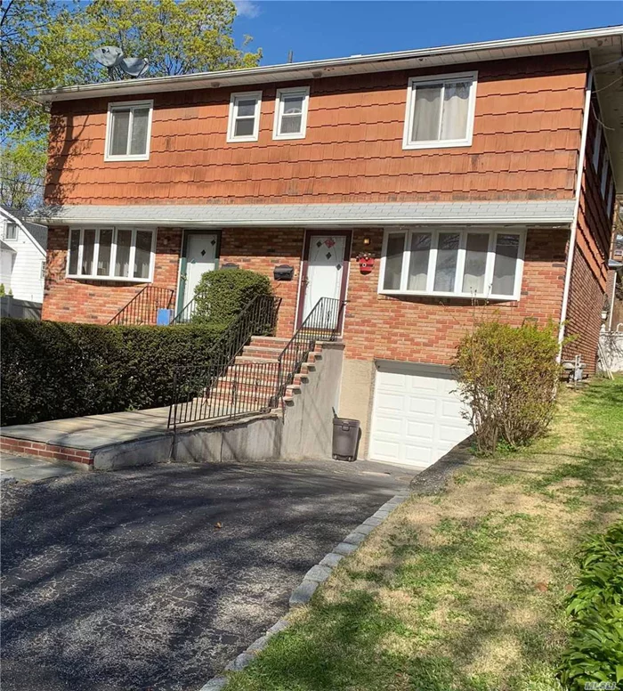 Semi-Attached 2 Family House, Bright And In Excellent Condition, Large 3 Bedrooms 2.5 Baths. Formal Dining Room, Living Room, One Car Garage, Finished Basement, Great Neck South HS, E.M. Baker Elementary. Very Close Proximity to Great Neck LIRR, Shopping, Dining And Much More!