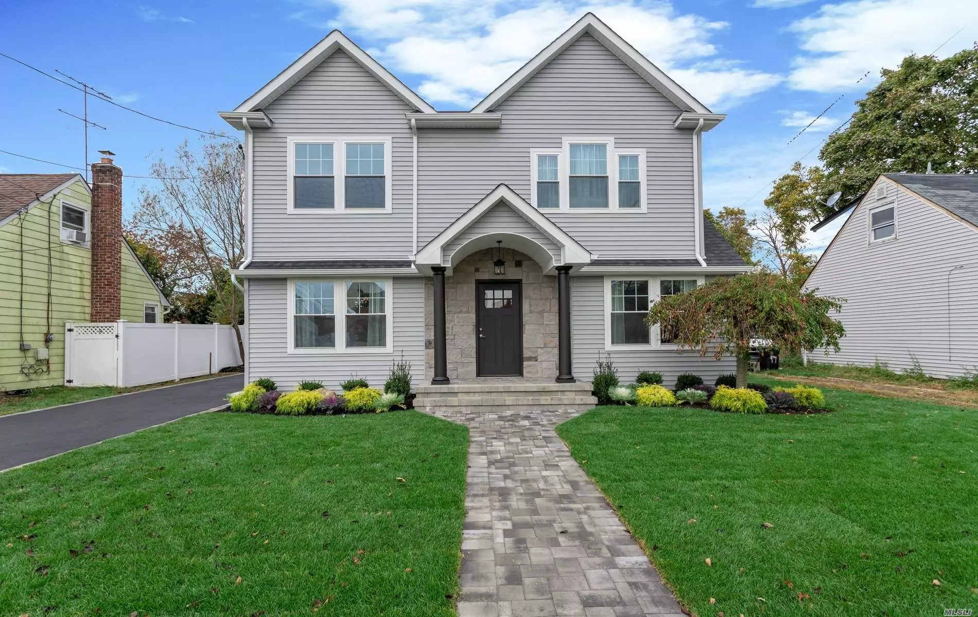 Completely Renovated 4 Bedroom, 3 Bath Colonial with High End Finishes.  Quartzite Countertops, Stainless Steel Appliances and Excellent Craftsmanship. Hard Wood Floors, CAC, Full Basement.  A Must See. Plainedge School District.