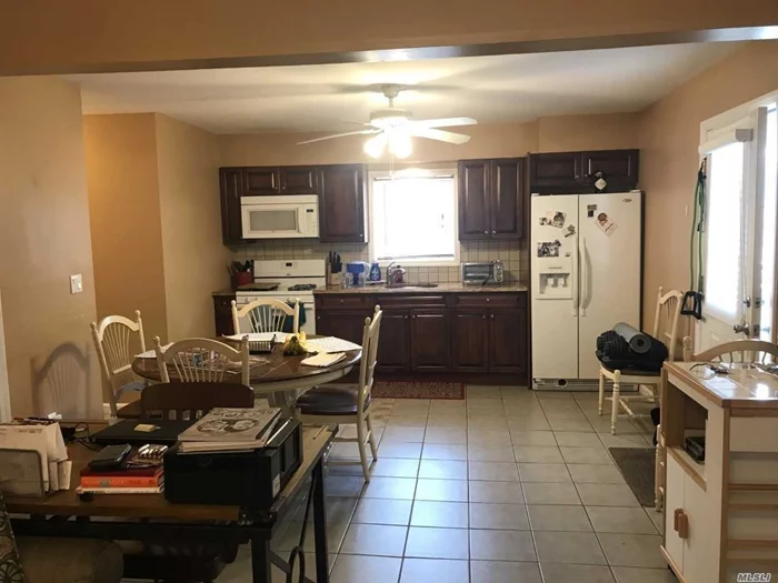 First Floor Apartment!! Open and Spacious Living room with Combo Kitchen/dining area. Full Bath in Hall and Large Bedroom. Includes Heat. Tenant pays own electric. Private Parking.