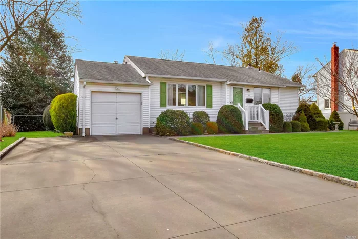 Welcome to this immaculate and well maintained Ranch home. Warm wood floors and bright large windows along with exceptional sized principal rooms all make this a very special property. The white on white kitchen is open to the dining area. Gas heating and cooking and central air conditioning. Fenced yard and newly landscaped.. This property offers .03 of land which is in the township of Huntington as well. ( taxes reflect total).