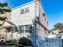 Great Location Beautiful Excellent Condition with new roof.New Bath Close to Northern Blvd Bus to Main st and Lirr.