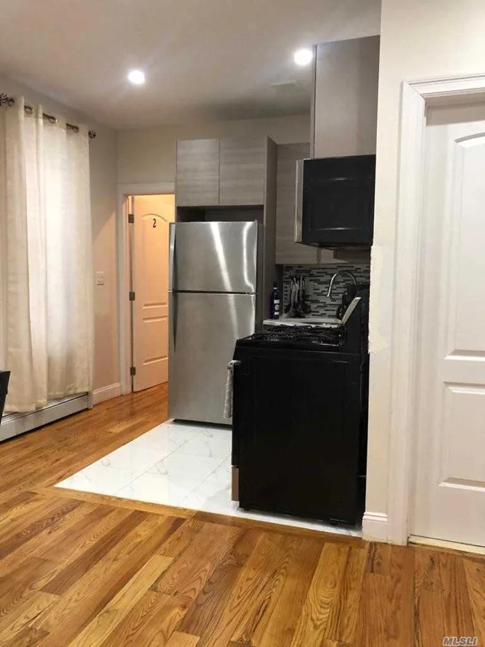 This home is a beautifully renovated 2 bedroom unit. Boasting new stainless steel appliances and beautiful stained wood floors with an open layout for the kitchen and dining/living space, this home is everything you desire..