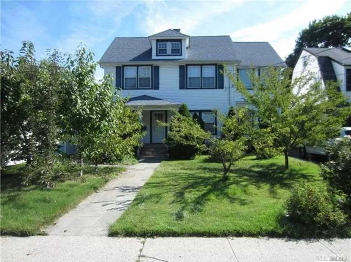 Lovely 1st floor apartment. New kitchen, new bath, fireplace, finished basement. Deck in the rear. Parking spot in the garage and 1 in driveway.