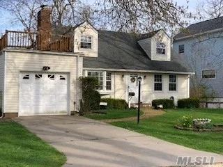 Located on a private dead-end street The Bay at the end of the block and a tranquil private beach right across the street. This beautiful and charming Cape Cod&rsquo;s first floor features a living room with a wood-burning fireplace, formal dining room, updated kitchen, 2 bedrooms, updated full bath, and laundry room. Upstairs are two additional bedrooms and a large half bath. Hardwood floors throughout the 1st floor, great huge closets, plenty of storage, ductless ac, inground sprinklers, and a spacious fully fenced yard. **Transferrable $761.00 Flood Insurance Policy**