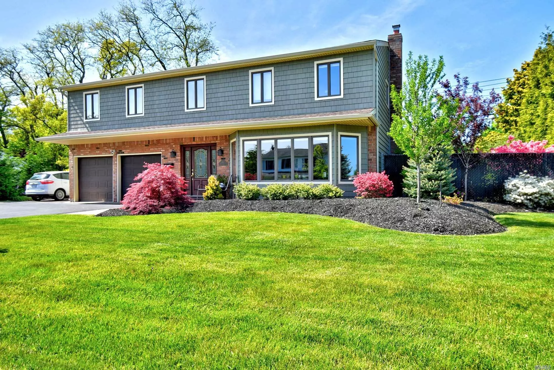 Master Carpenter and Avid Gardeners Home (as seen on the Islip Historical Garden Tour). Custom Woodworking throughout this approx 2500 square foot 4 Bedroom, 2.5 Bath Colonial in Islip Hamlet. The moment you step into the entry foyer with it&rsquo;s warm oak staircase in front of you, radiant heated porcelain floors under your feet you feel the warmth of this amazing home. Not to mention the CAC, CVAC, Chefs kitchen, banquet dining room and OH that Master Bath Shower!! Step outside to your paver patios, outdoor speakers, Weber Grill w/natural gas, perennial gardens, in ground sprinklers, She shed, He Shed and SO MUCH MORE! Perfect for commuters with the commuter path right close by to the LIRR Islip train station. Close to town with shops, restaurants and post office also a quick trip to the Islip beach with bay-front dining and playground. This is truly a must see! Call today for more information.