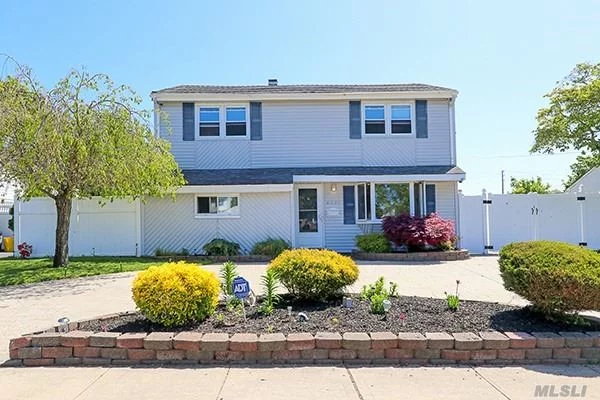 Prime Location for this wonderful Colonial in Plainedge Schools. Room For Everyone!! Possible mother/daughter with proper permits, mid block location, fully front & rear dormer. All large rooms upstairs, radiant heated porcelain tiles throughout , interchangeable layout, and LOW Taxes!! Semi built in Oval pool 12x24, Burham burner, In-ground sprinklers,  Too much to list!! Contact Diana Hiotis 516-322-4893