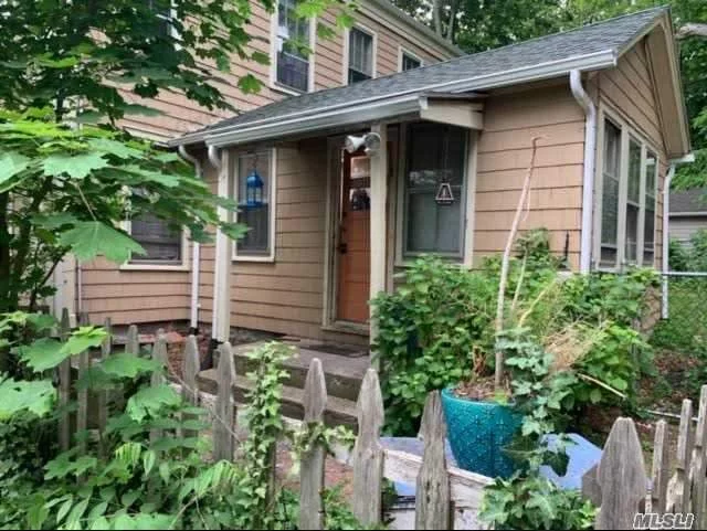 This is a Duplex w the Main Floor available w access through the Front Door or Rear Kitchen Access. Private Yard and Private Parking, Walk to the Village.