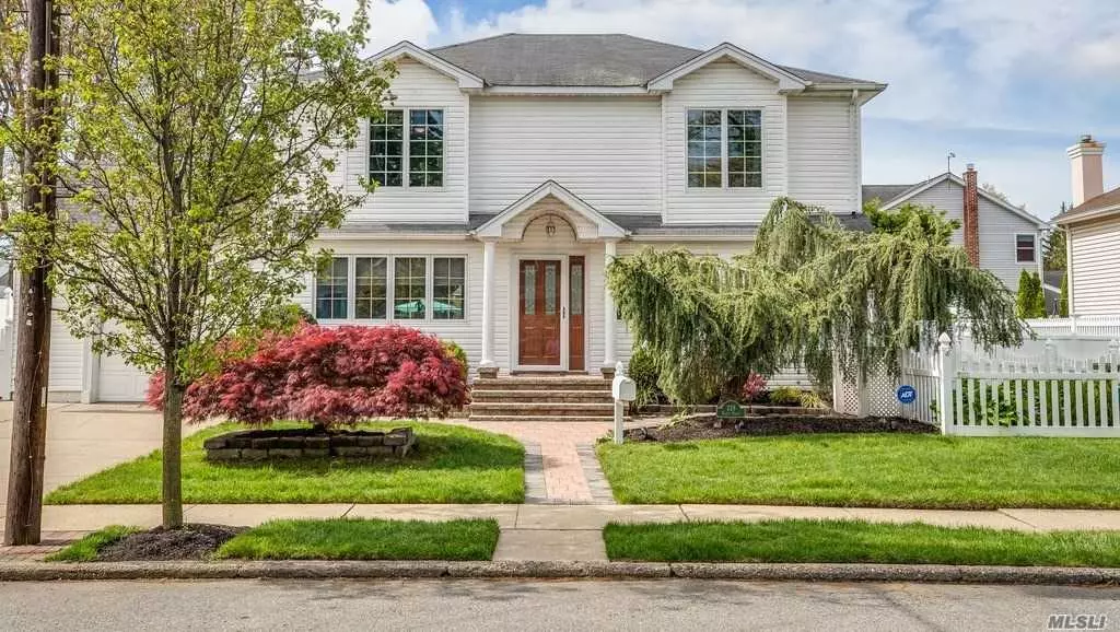 Gorgeous Colonial In Desirable Massapequa Park. Tons Of Curb Appeal. Open Concept Living, Dining, Family Rm W/Fireplace, Granite Kitchen, Large Master W/Ensuite, Space For Home Office Or Playroom, Full Basement W/OSE, Stunning Oasis Yard W/IG-Pool. This House Has It All. Call Today To Make It Yours.