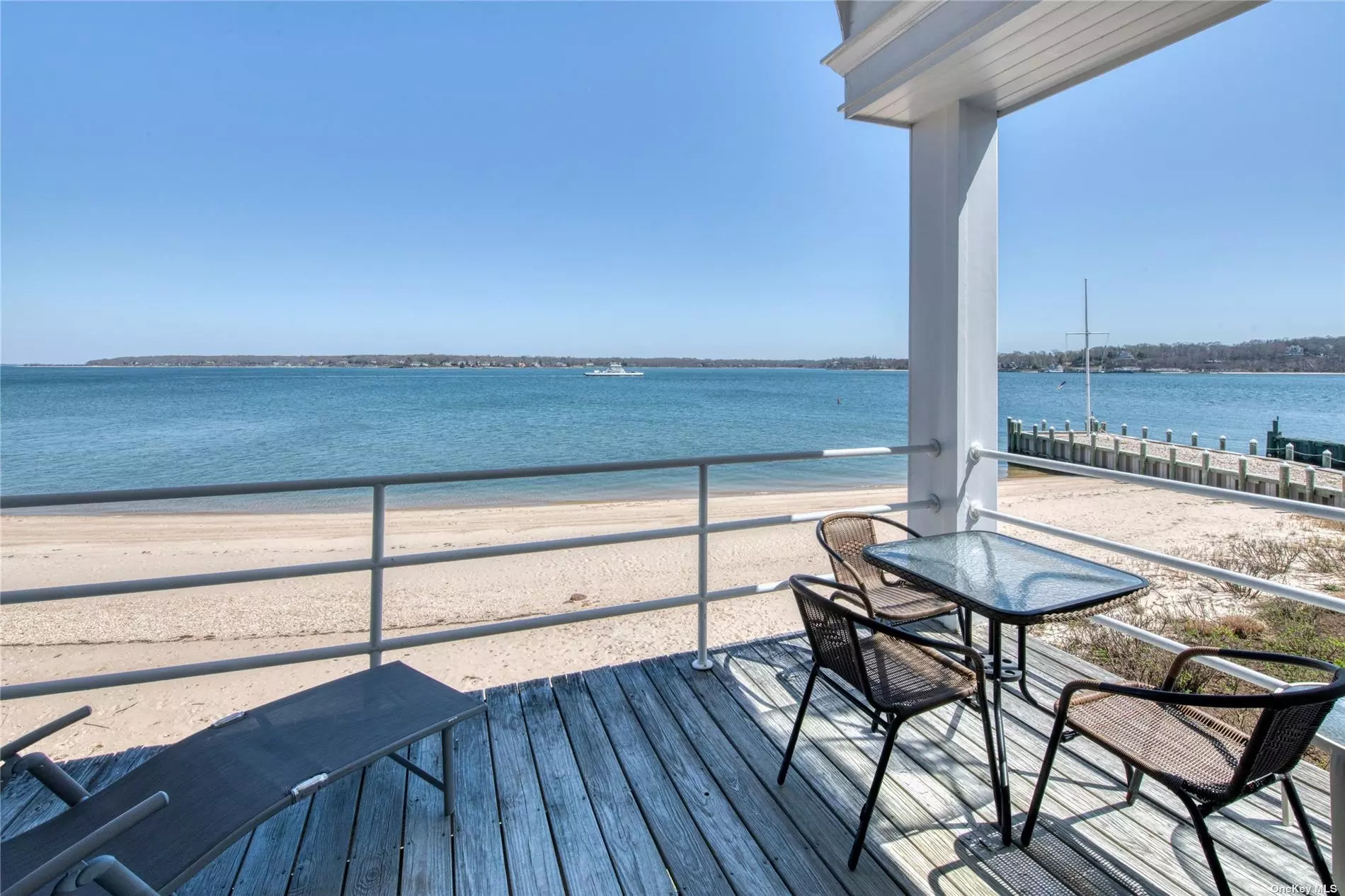 Newly Renovated Unit W/Spectacular Views Of Bay, Beach & SI Beyond. 2 Bed/ 2 Bath. Styled Elegantly. Open Plan W/ Views From Every Window. Waterfront Balcony On Beach. Complex has a Waterfront Pool, Tennis & Pickle Ball Court & Over 200 Ft of Bay Beach. Rental Includes a Boat Slip in Marina. In Heart Of Village. Close To Restaurants, Transportation, Ferry & Shops. (Greenport Rental Permit #24-059) Rented for Summer 2024.