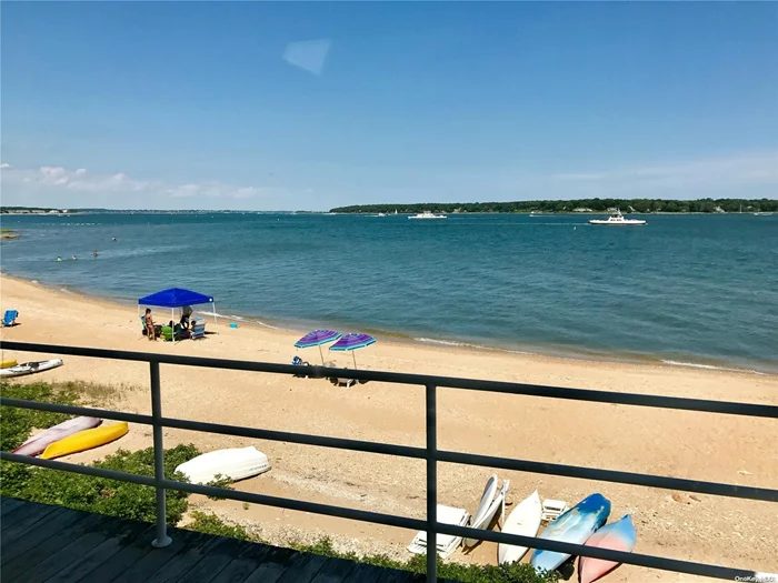 Newly Renovated Unit W/Spectacular Views Of Bay, Beach & SI Beyond. 2 Bed/ 2 Bath. Styled Elegantly. Open Plan W/ Views From Every Window. Waterfront Balcony On Beach. Complex has a Waterfront Pool, Tennis & Pickle Ball Court & Over 200 Ft of Bay Beach. Rental Includes a Boat Slip in Marina. In Heart Of Village. Close To Restaurants, Transportation, Ferry & Shops. (Greenport Rental Permit #24-059) Rented for Summer 2024.